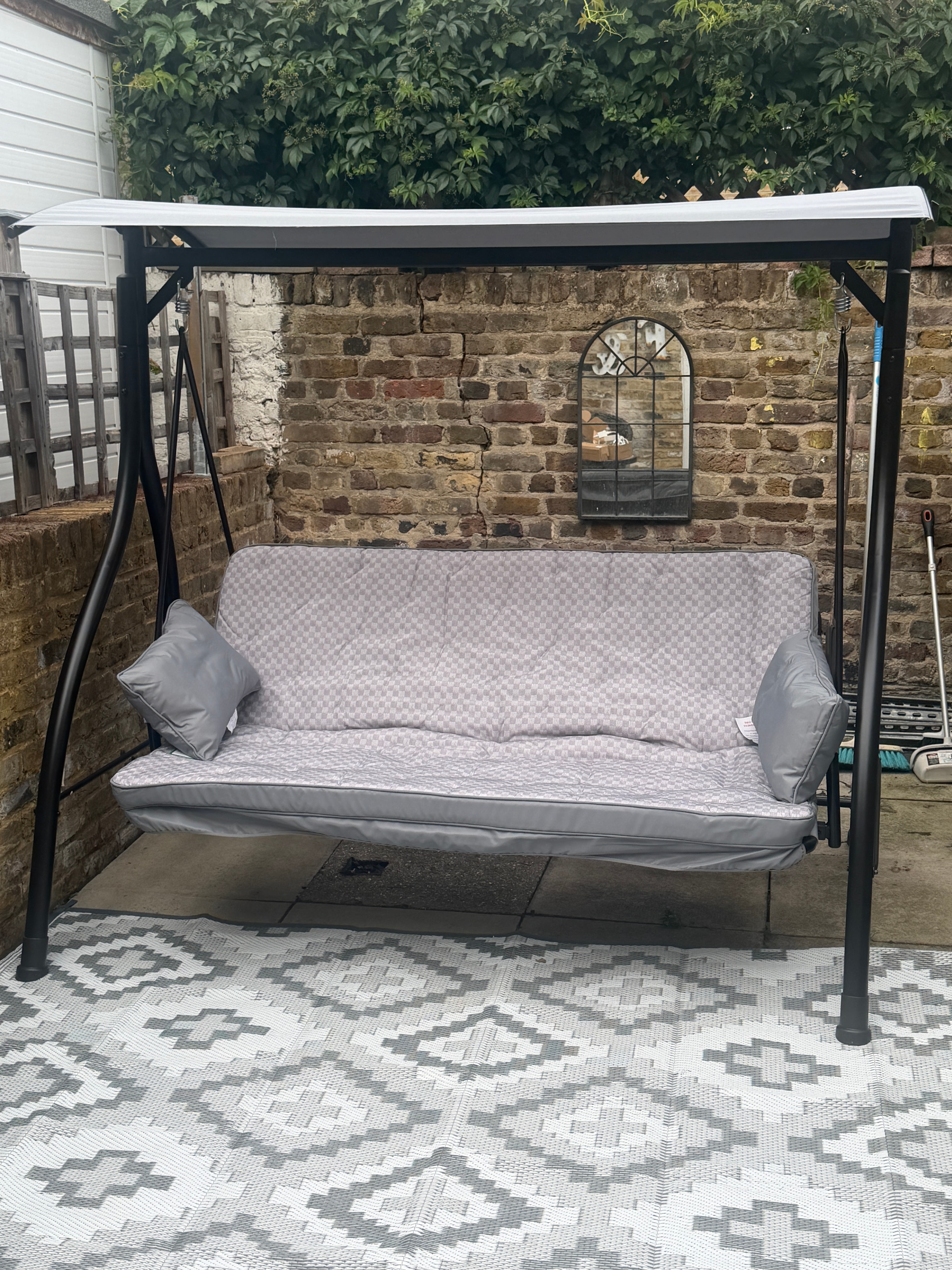 White bunk bed with under-bed storage unit and ladder assembled